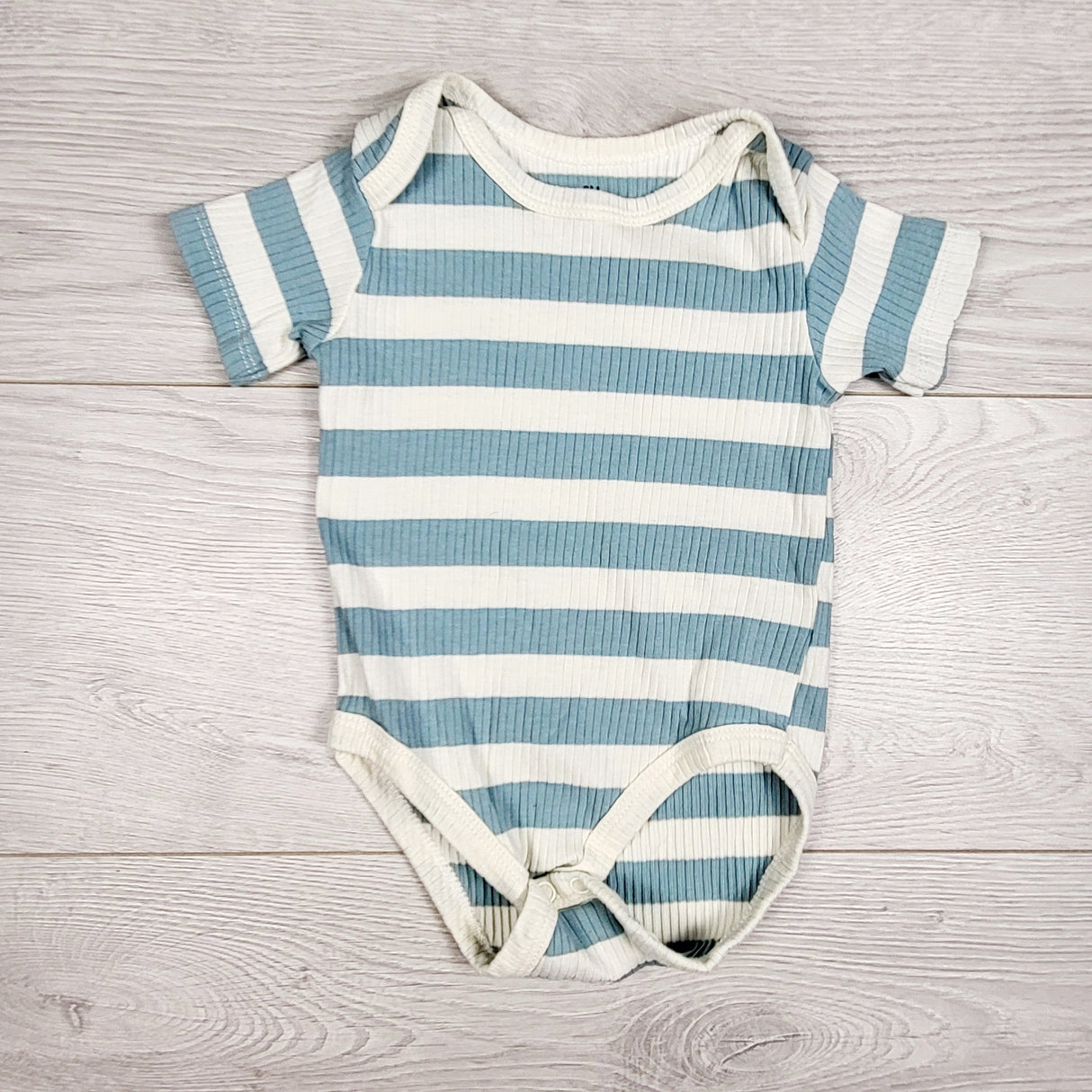 Aqua and cream striped ribbed bodysuit. Size 6 months