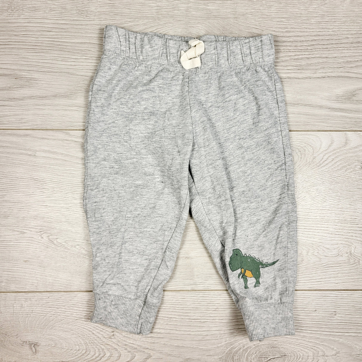 Carters grey lightweight pants with dinosaurs. Size 9 months
