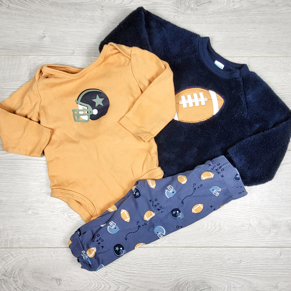 Pekkle 3pc set with football theme. Size 9 months