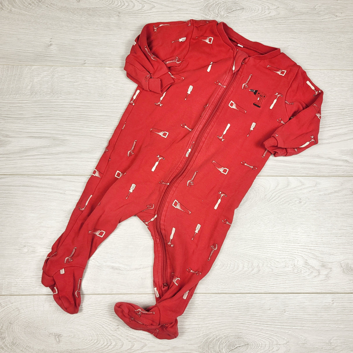 Pekkle red zippered sleeper with tool theme. Size 6 months