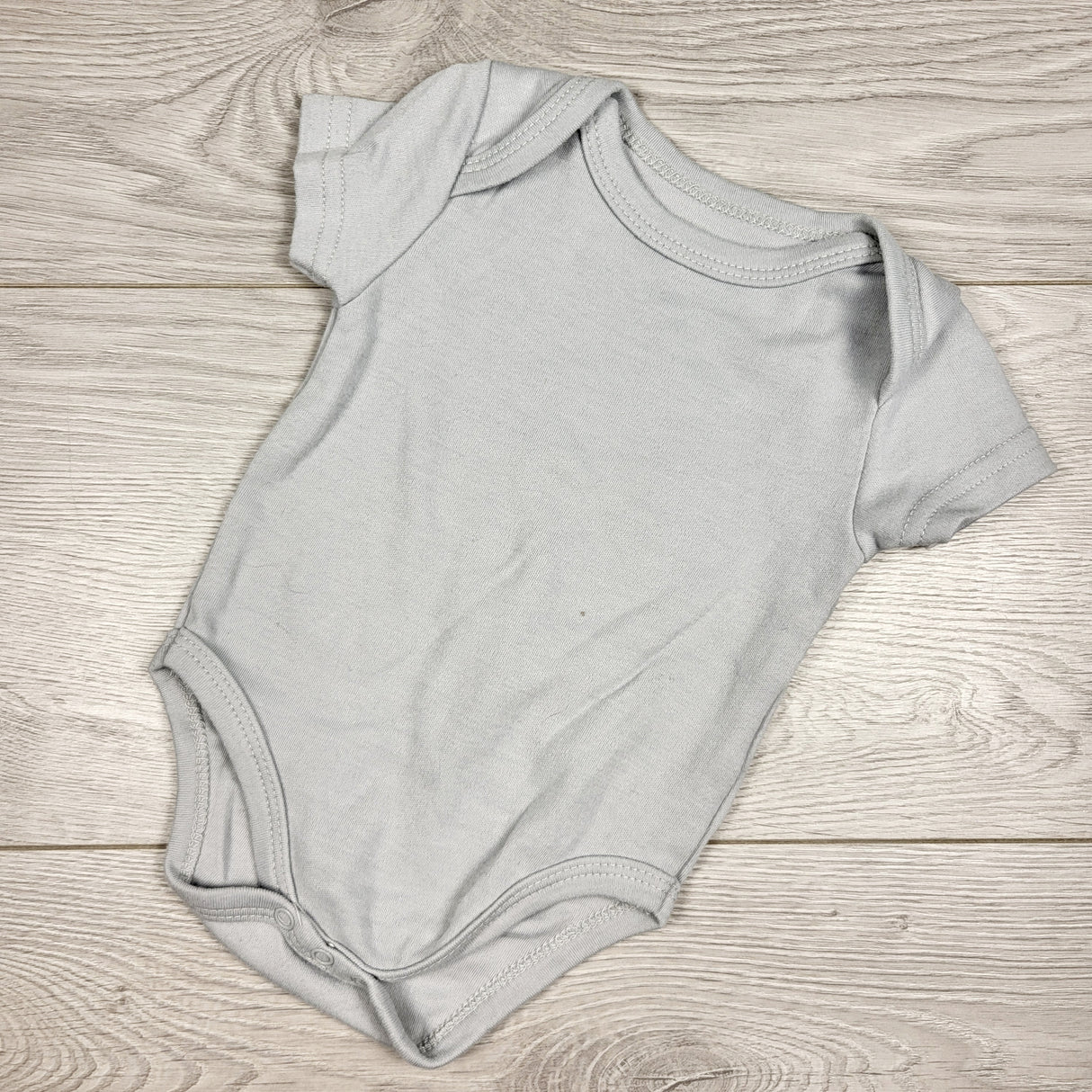 Baby Mode solid grey bodysuit. Size 3-6 months