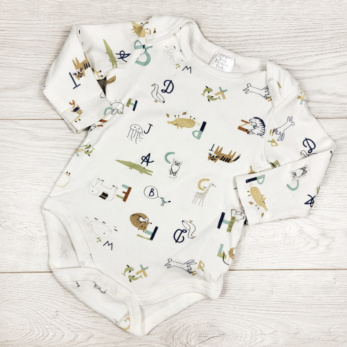 Trea Beau Belle white pima cotton bodysuit. Size 6-9 months