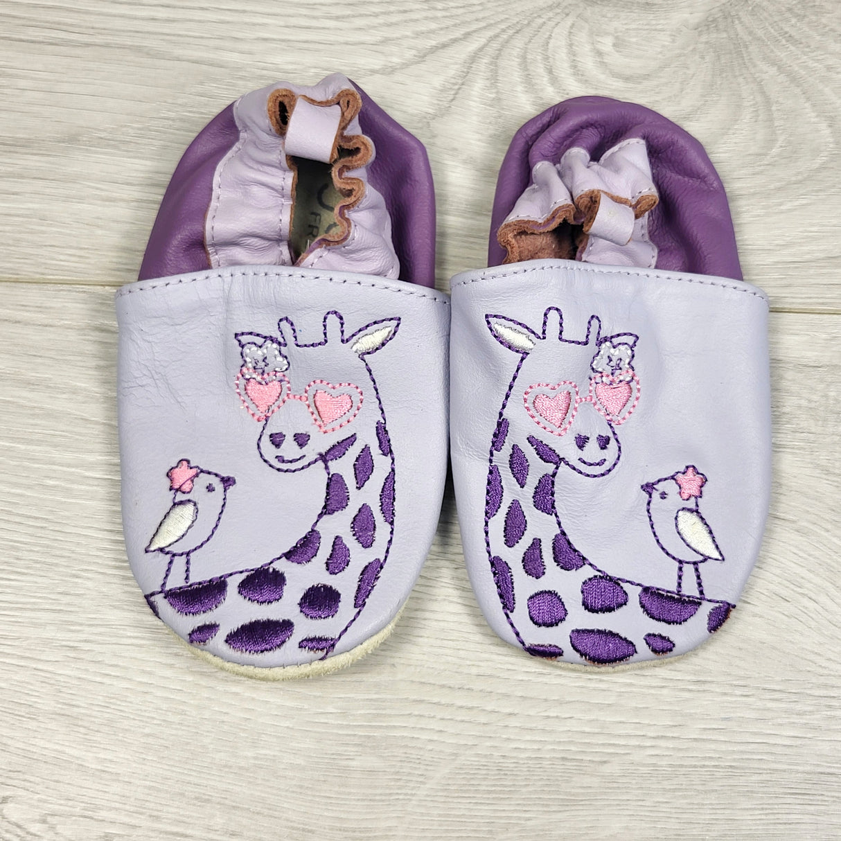 Joe purple soft soled shoes with giraffe and bird. Size 18-24 months