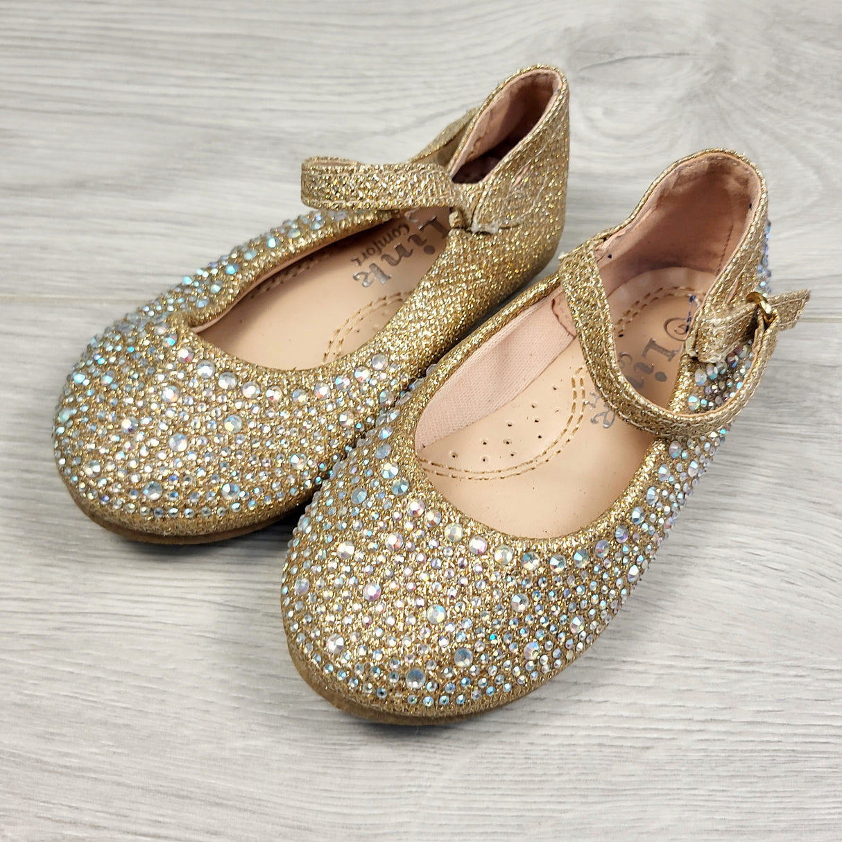Link gold bejeweled flats. Size 5