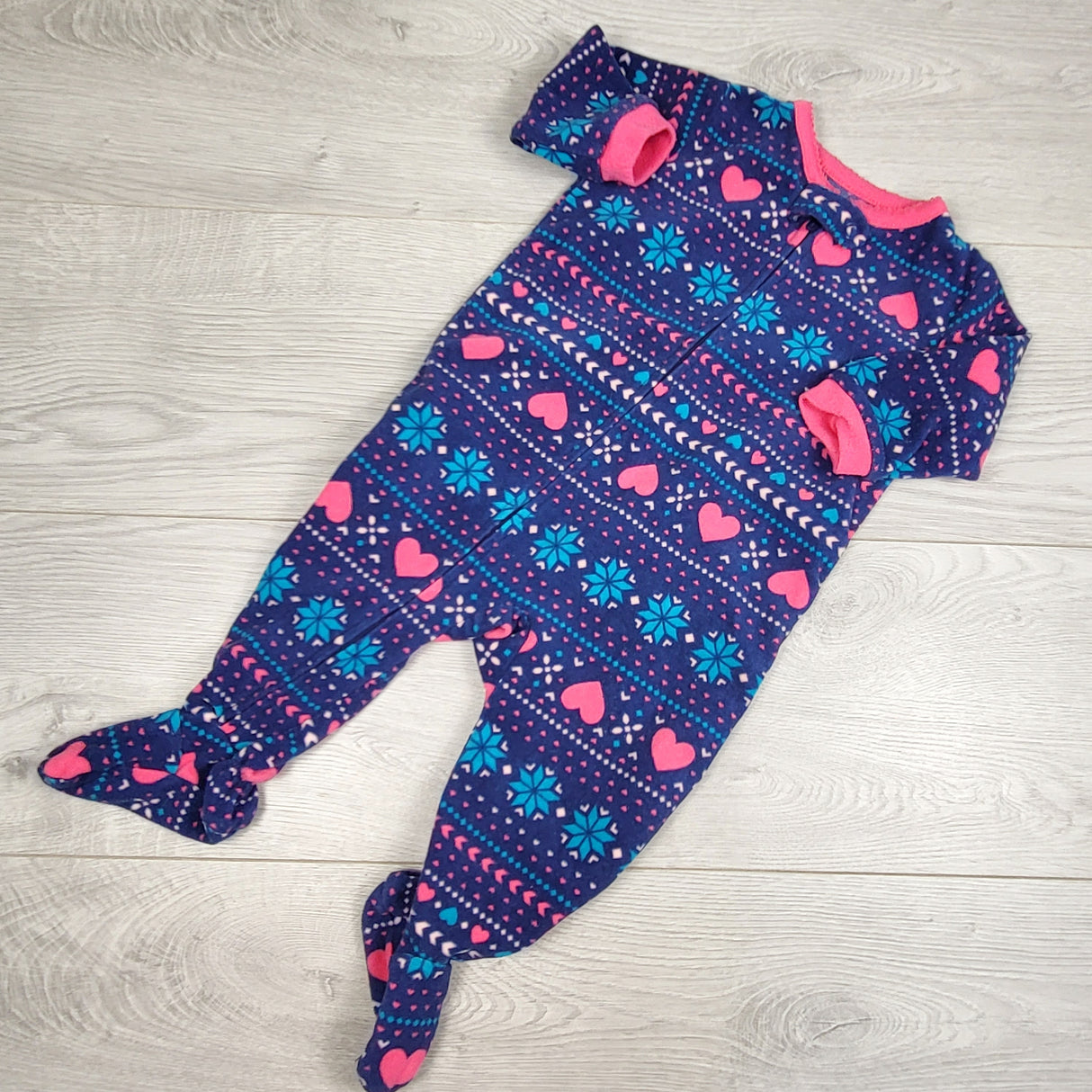 Carters blue patterned zippered fleece sleeper. Size 6 months