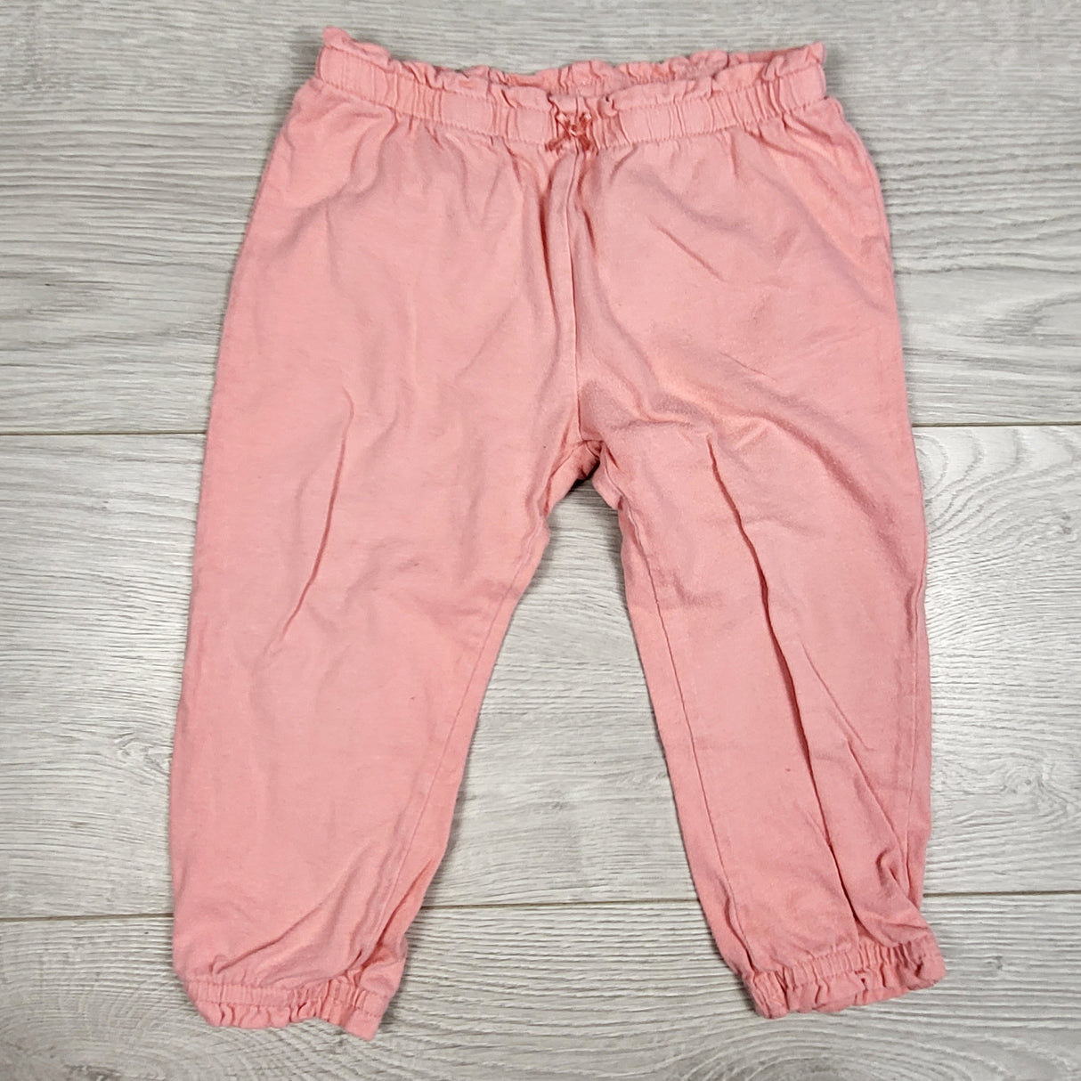 Carters pink cotton pants with ruffle waist. Size 18 months