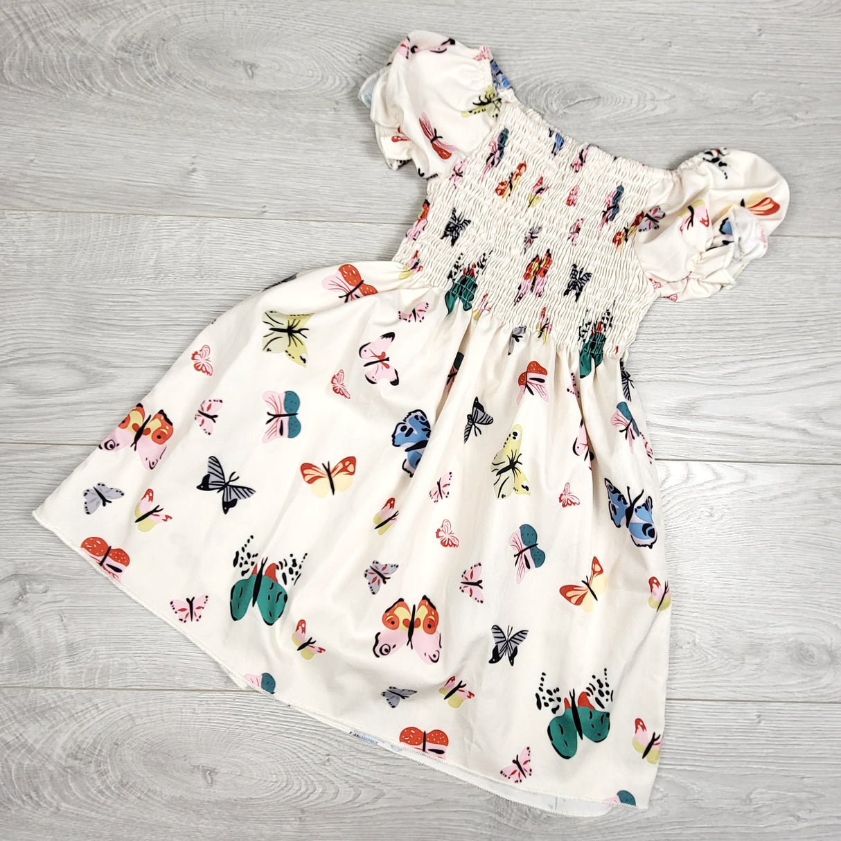 Unbranded white smocked butterfly dress. Size 3T