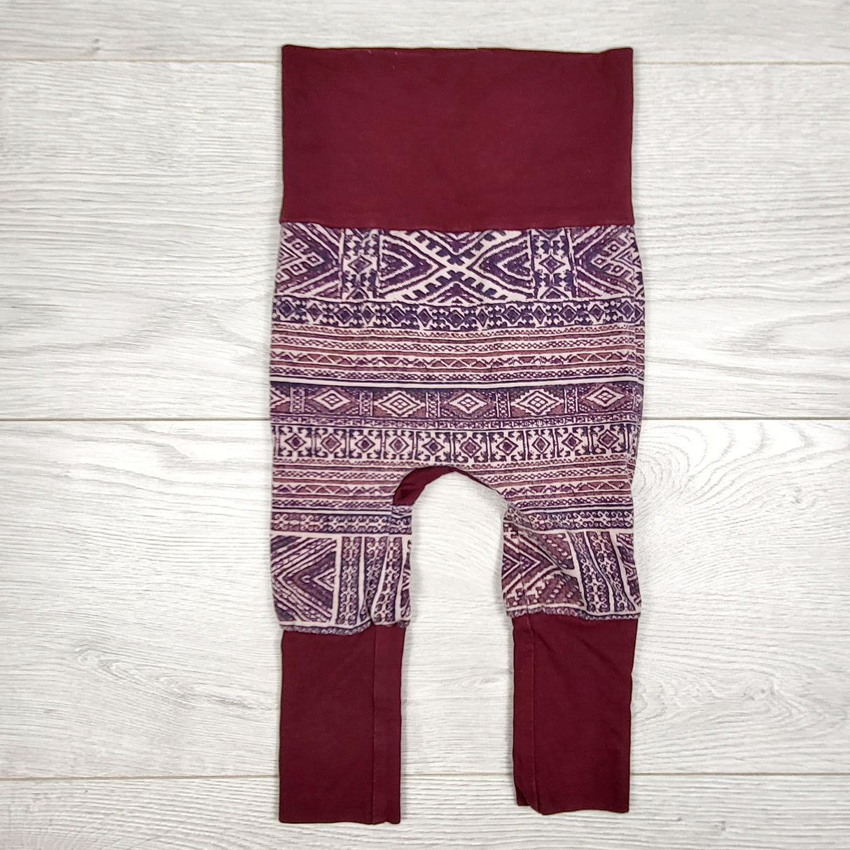 Handmade burgundry print grow with me pants. Sizes like 3 to 12 months