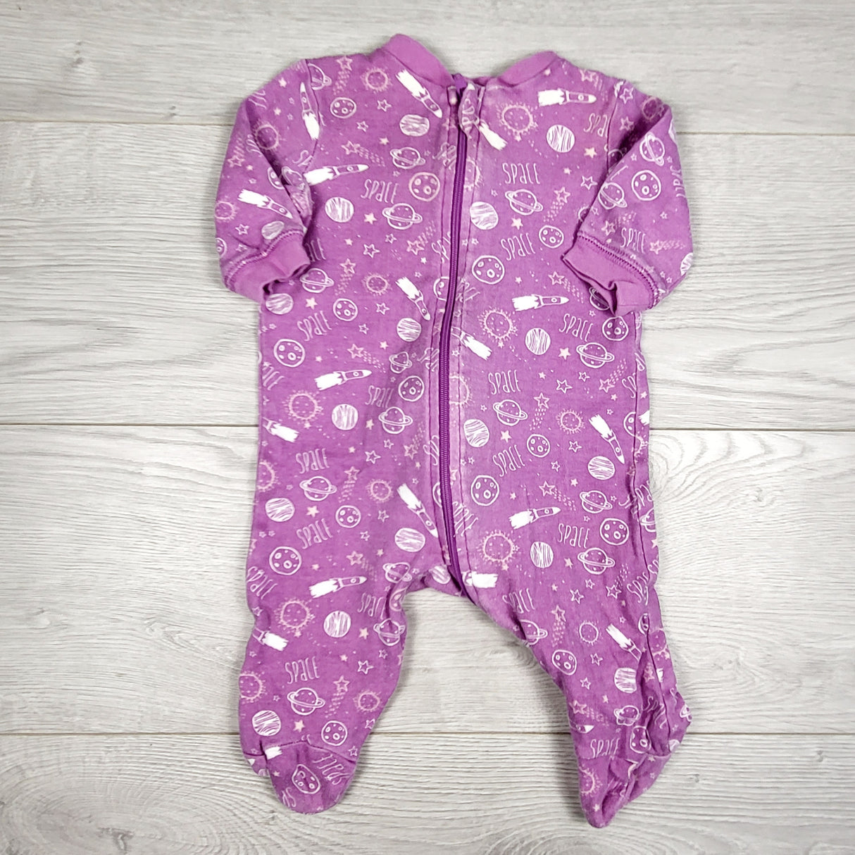 George purple space themed zippered sleeper. Size 0-3 months