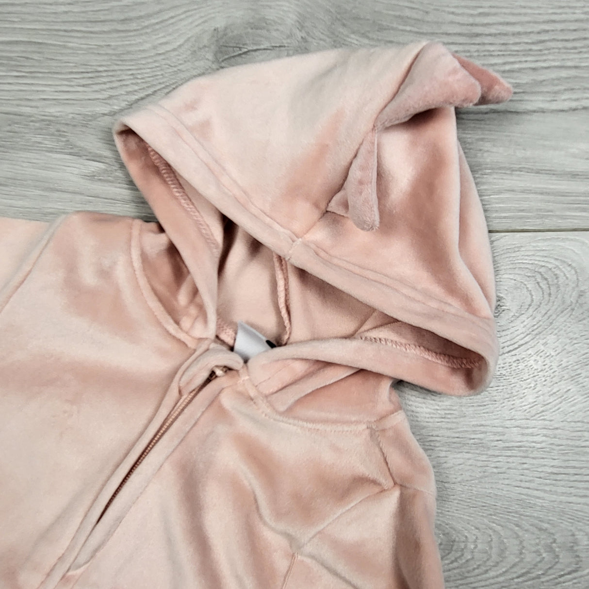 Old Navy pink hooded velour romper with scales. Size 3-6 months