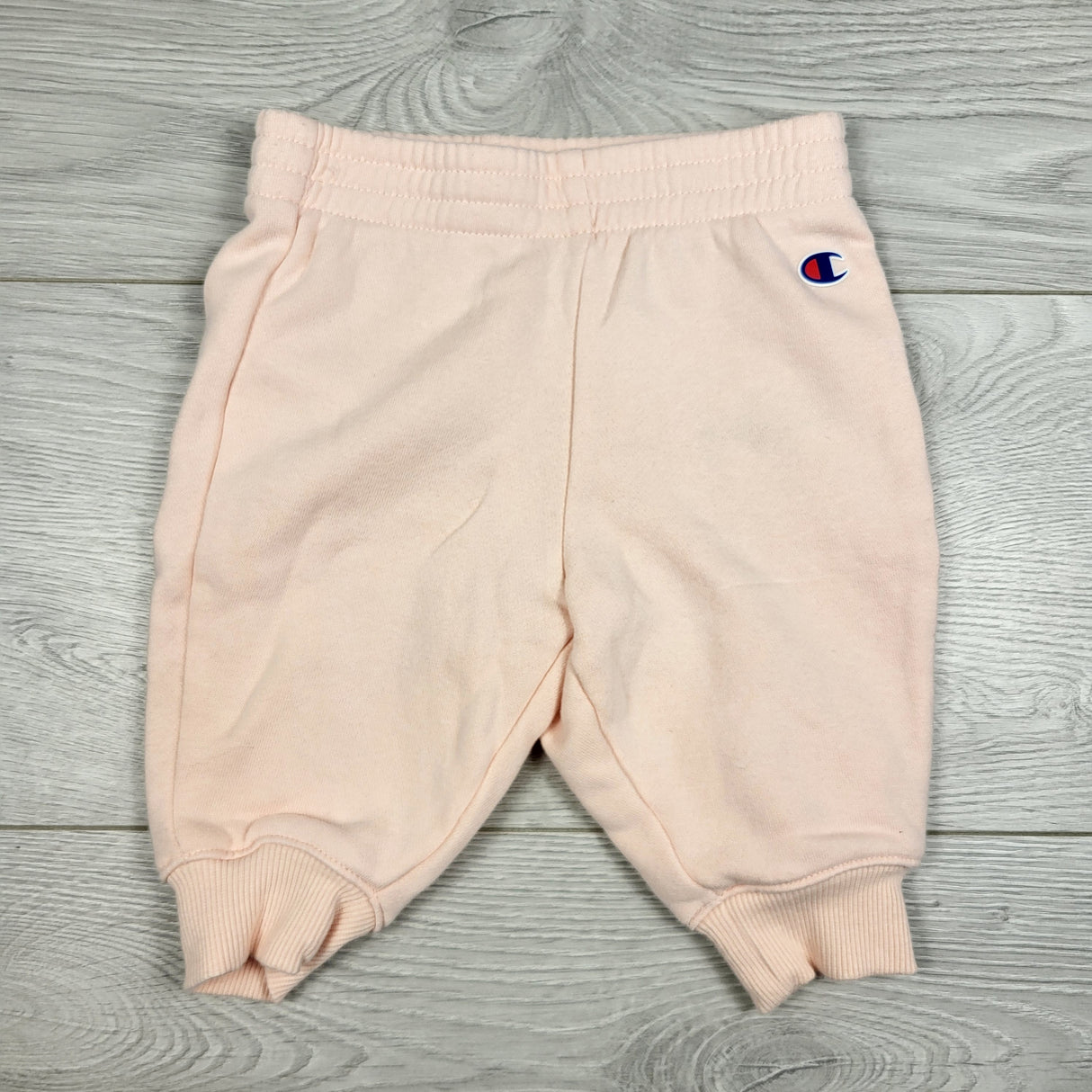 Champion light pink fleecy lined pants. Size 3-6 months