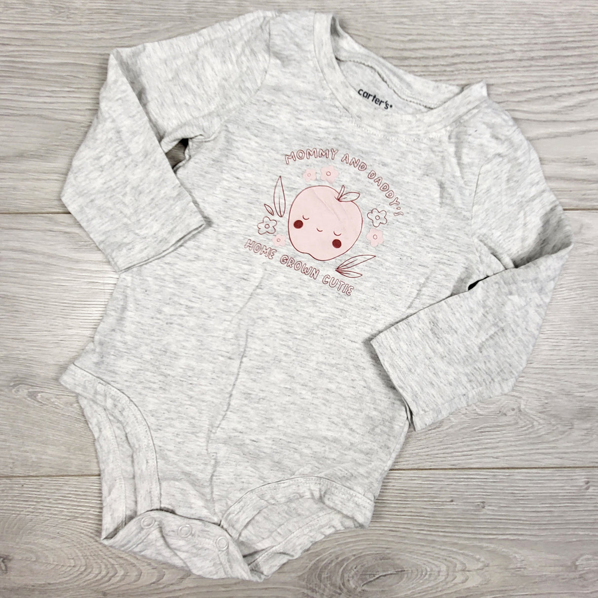 Carters grey "Mommy and Daddy's Homegrown Cutie" bodysuit. Size 9 months