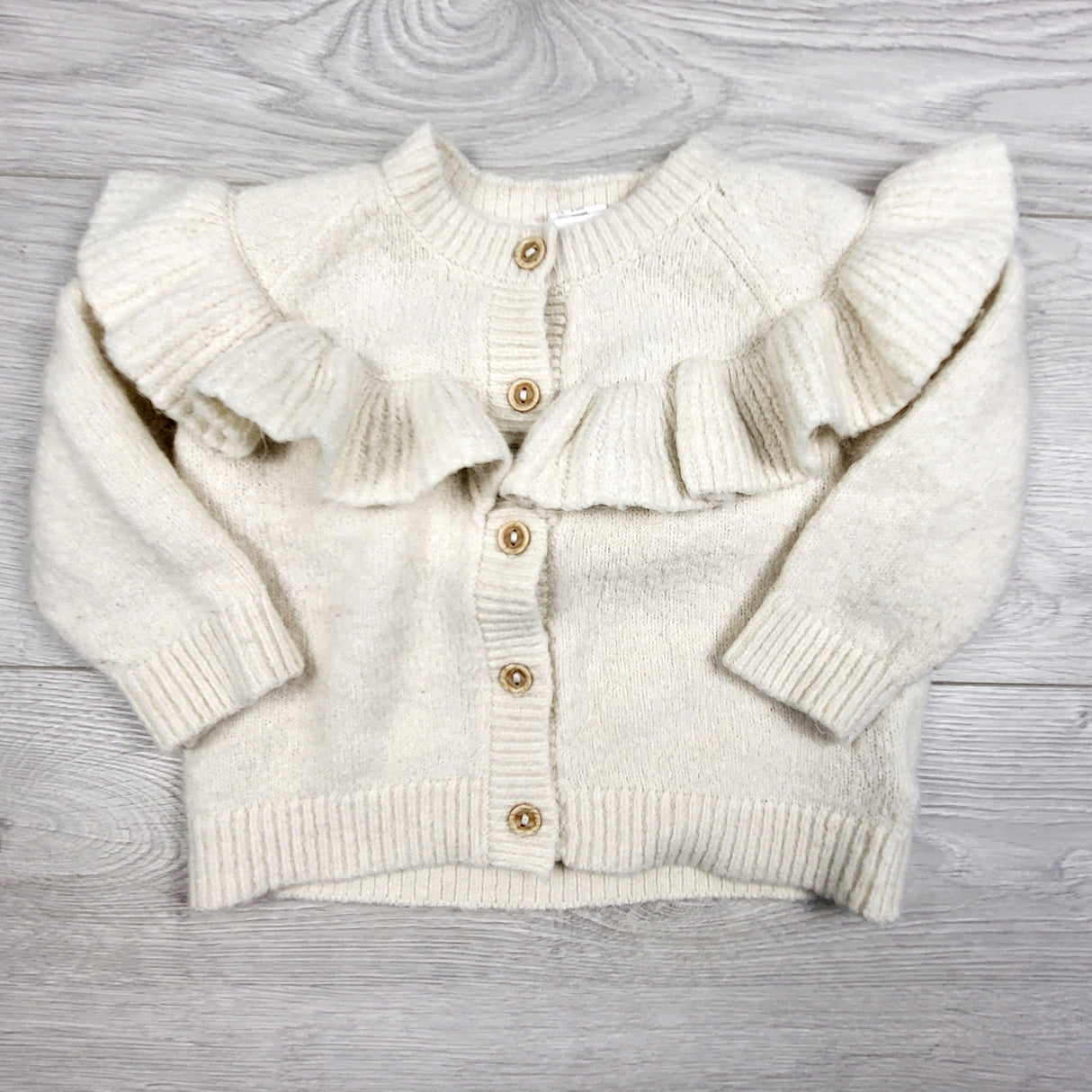 H and M ruffle cardigan sweater. Size 4-6 months