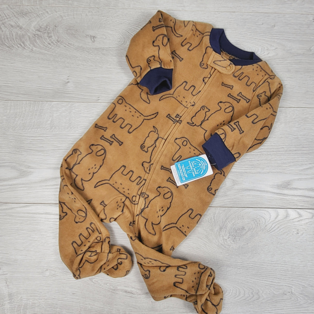 NEW - Carters blue zippered fleece sleeper with dogs. Size 6 months