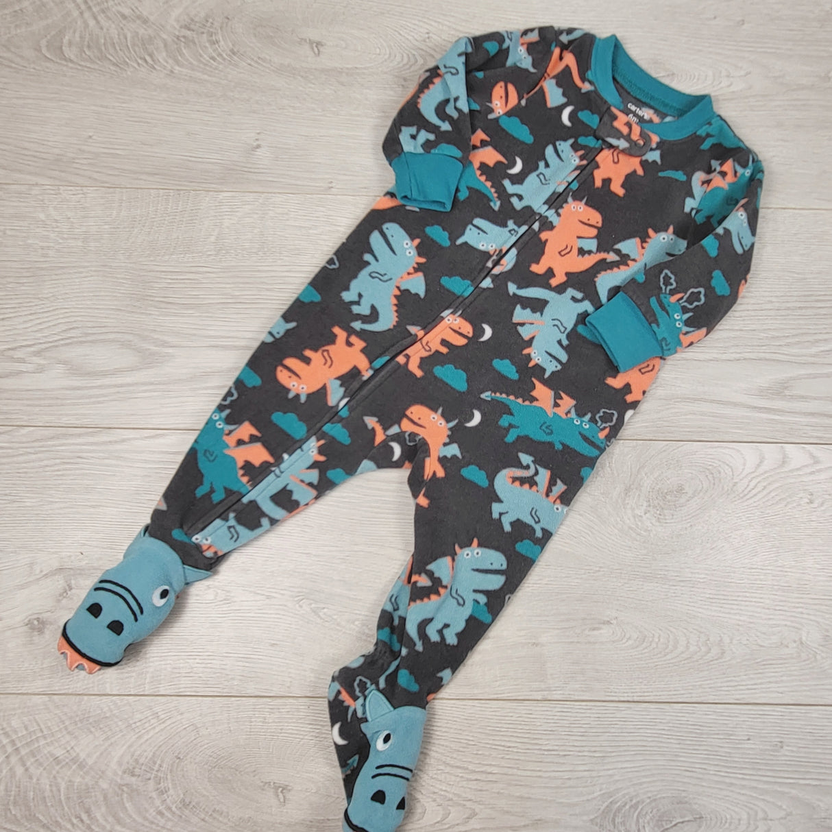Carters grey zippered fleece sleeper with dinosaurs. Size 6 months