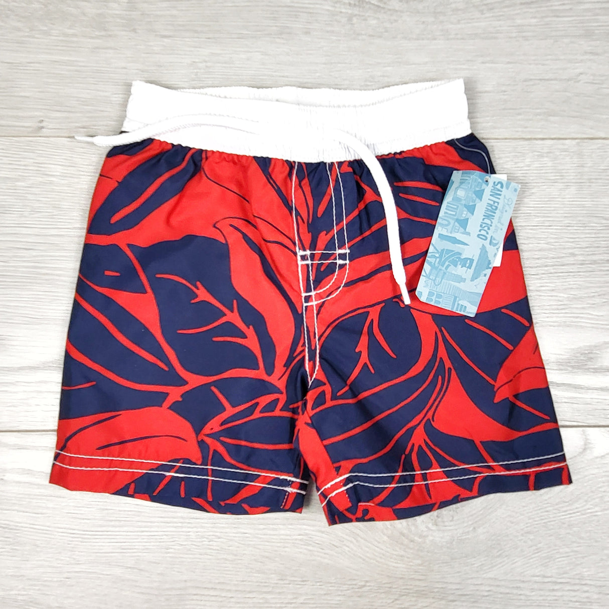 NEW - Old Navy red and navy leaf patterned swim shorts. Size 12-18 months