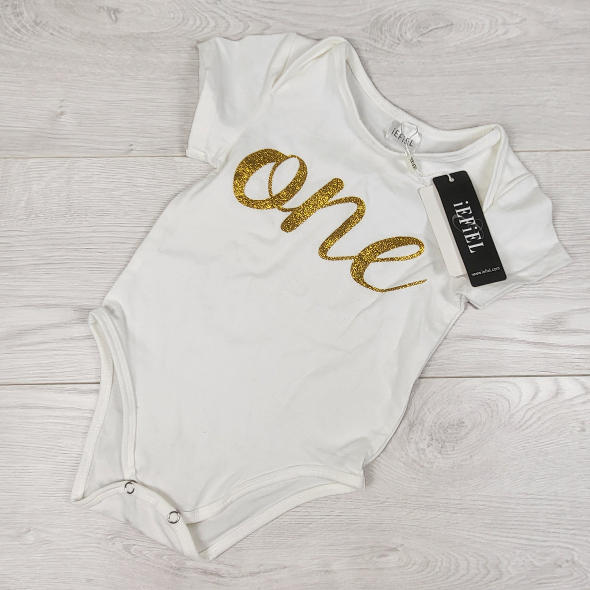 NEW - Iefiel white "One" bodysuit. Size 6-12 months