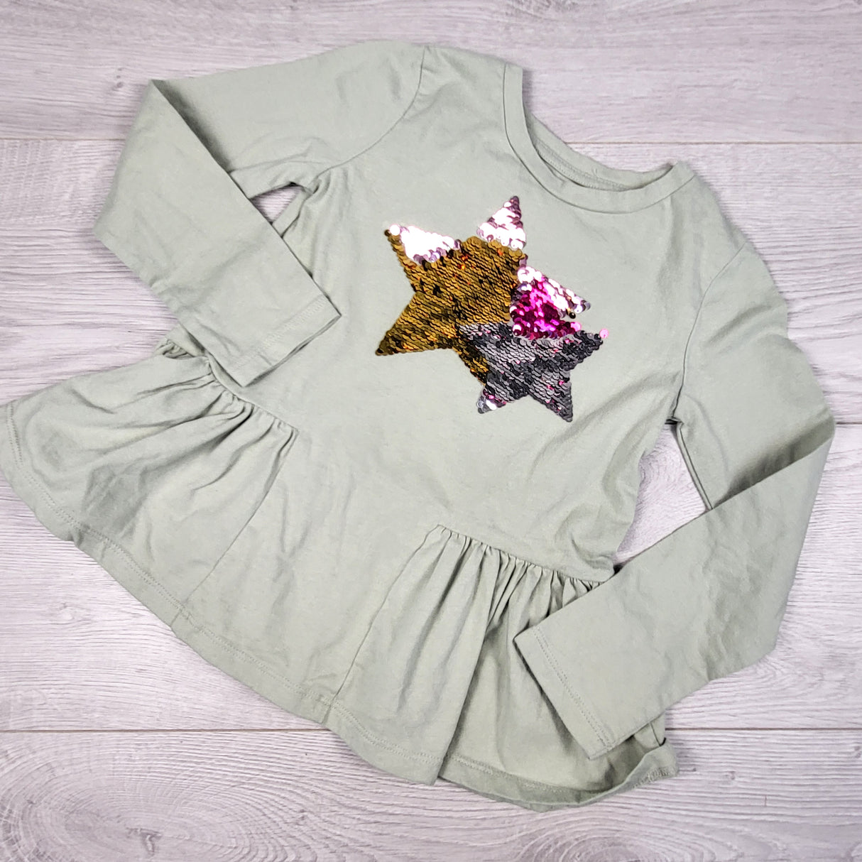 George green top with sequin star. Size 6