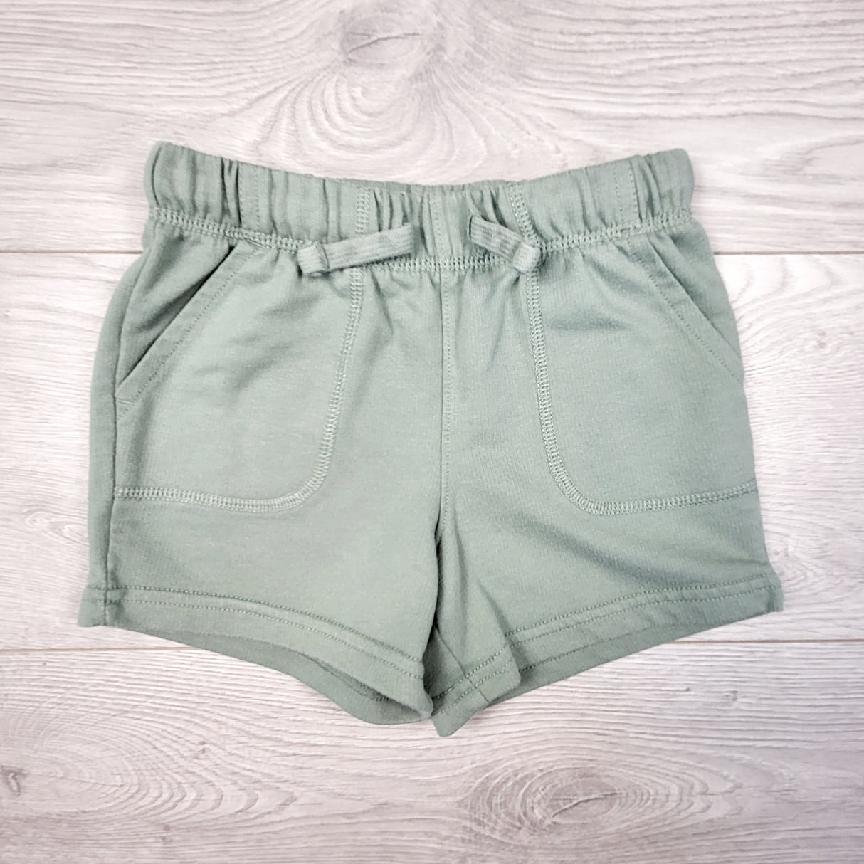 Carters green drawstring shorts. Size 4T