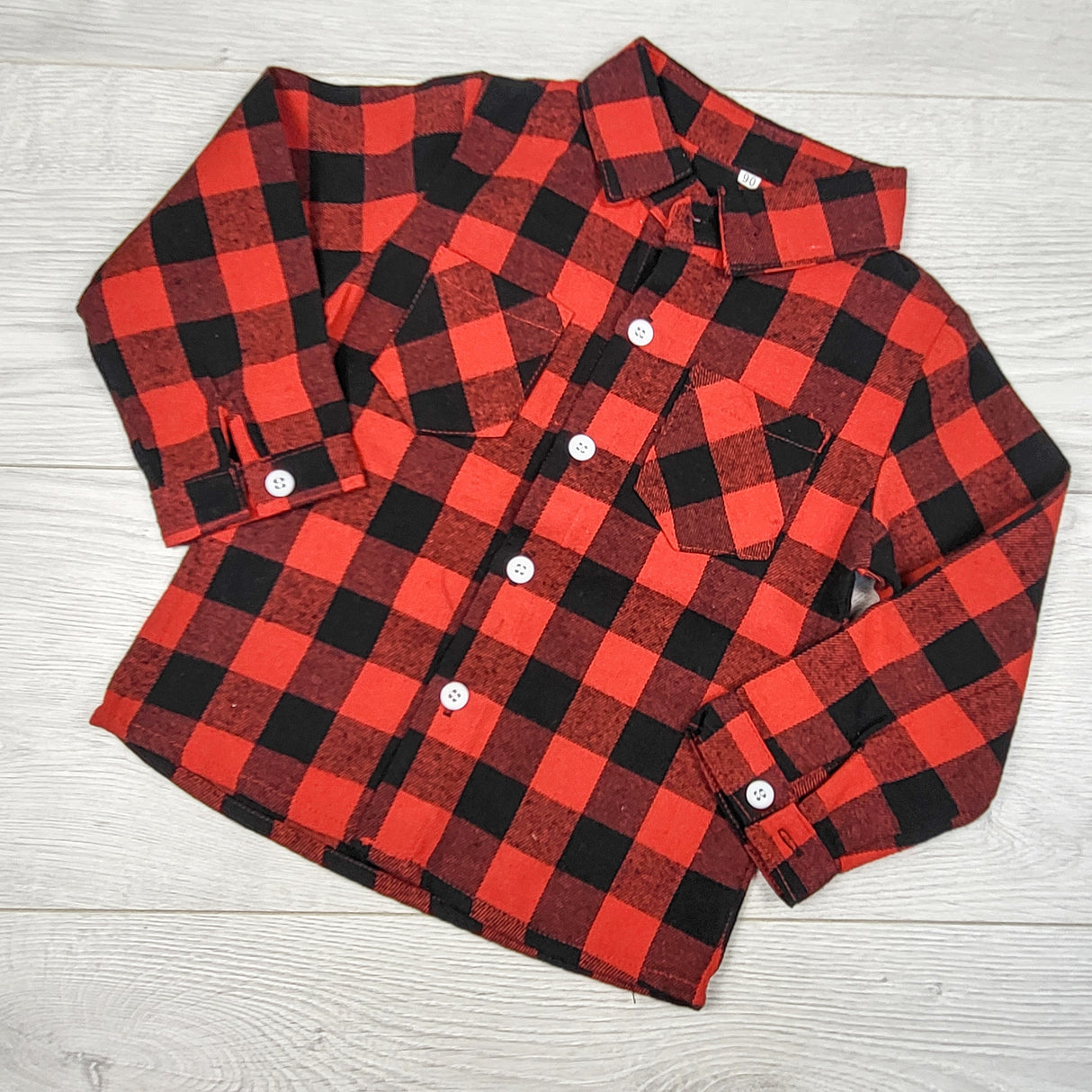 Red buffalo plaid flannel button down shirt. Size 9-12 months