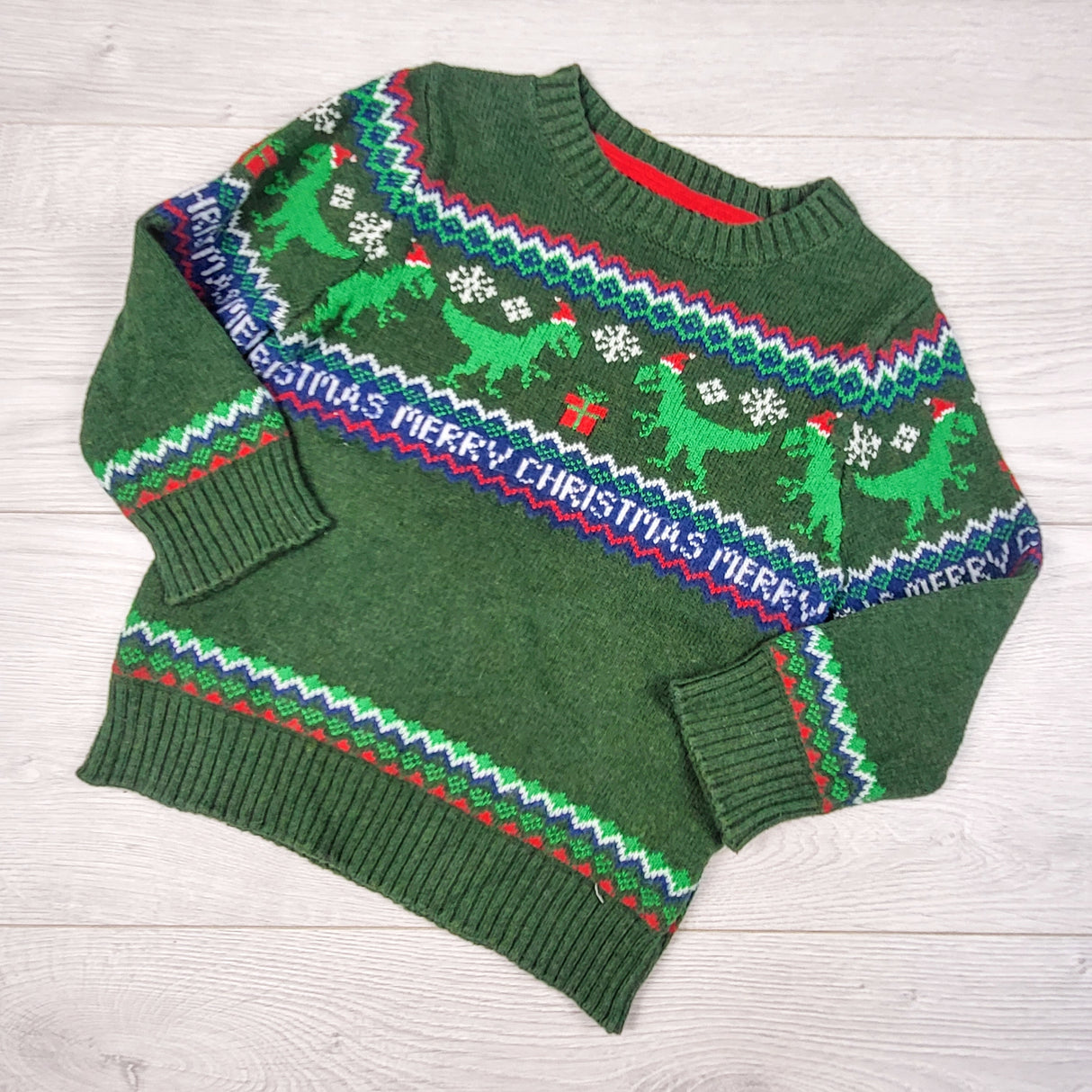 L.O.G.G. (H and M) green sweater with Christmas dinosaurs. Size 18-24 months