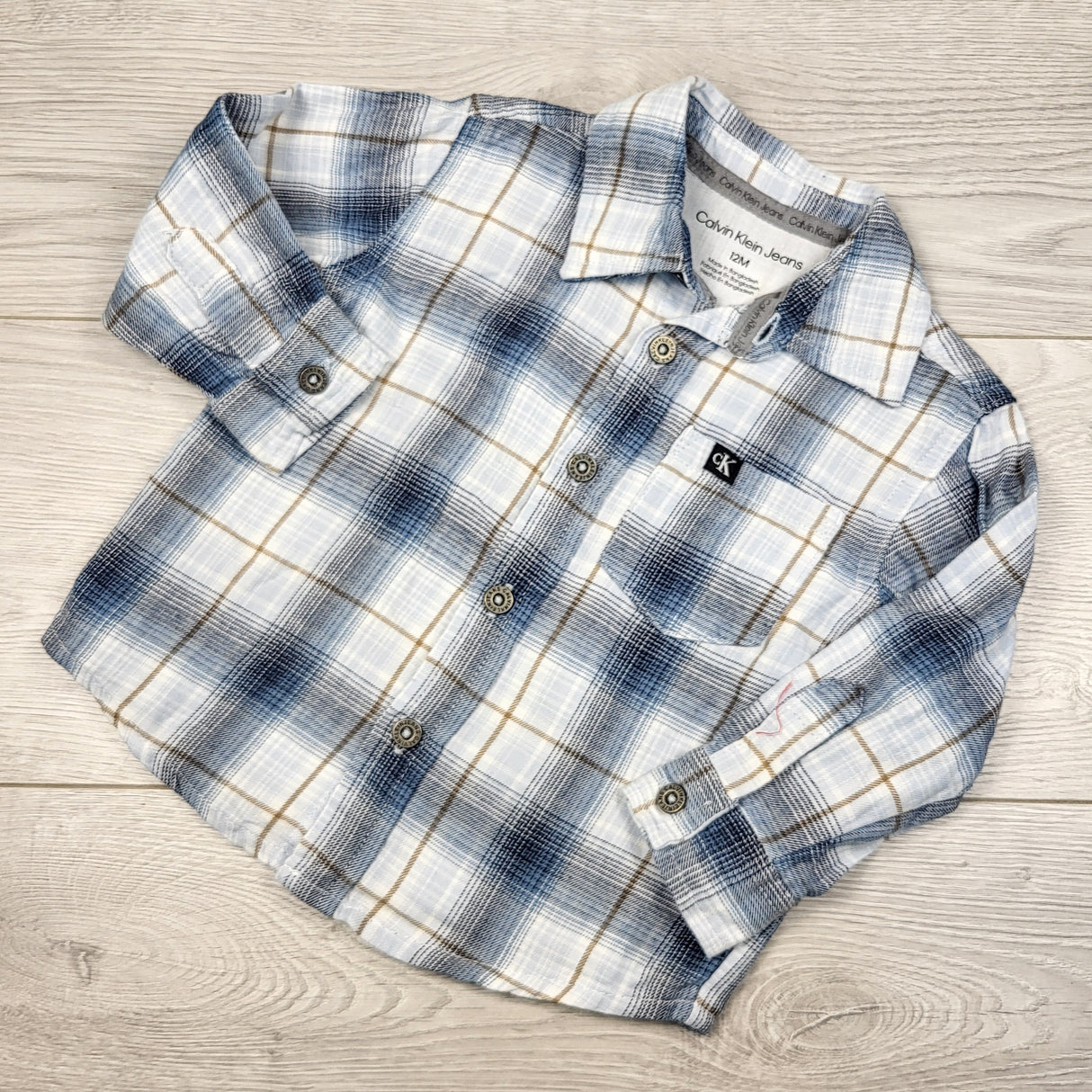 Calvin Klein blue and white plaid button down shirt. Size 12 months