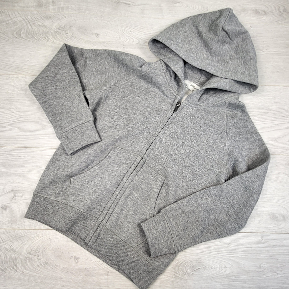Cambridge grey fleece lined zip up hoodie. Size XXL (seems like 6-8 Years)