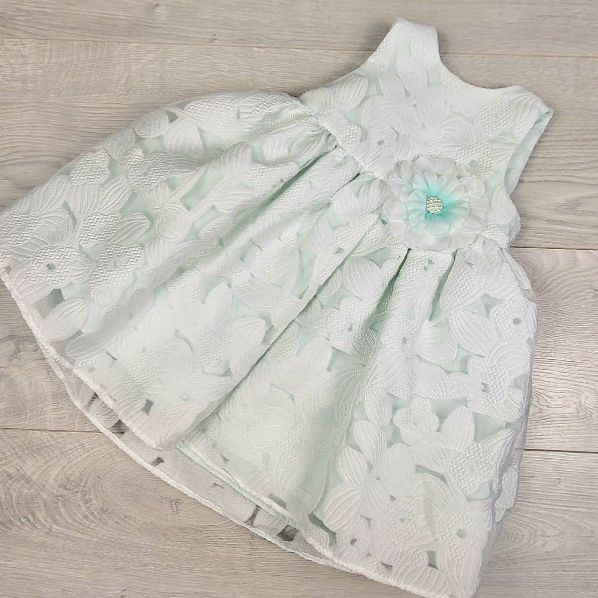 Marmellata special occasion dress with icy mint undertones. Size 12 months