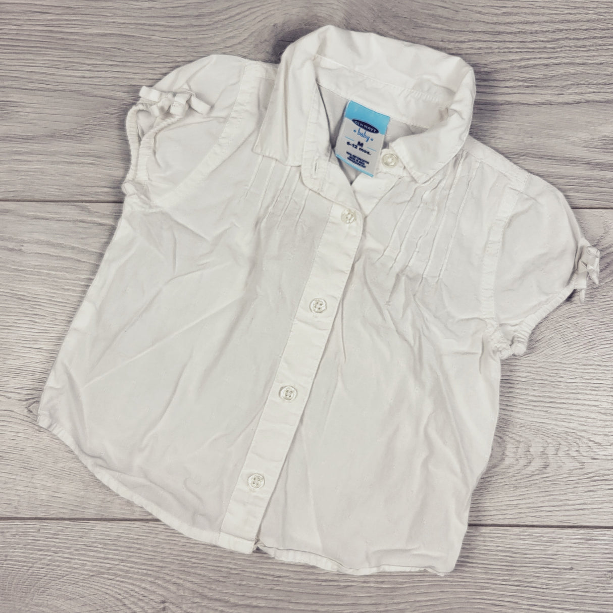 Old Navy white button down blouse. Size 6-12 months