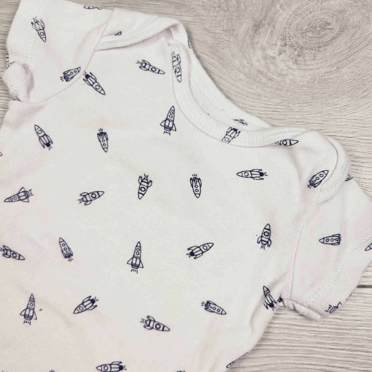 Carters white bodysuit with rockets. Size 3 months