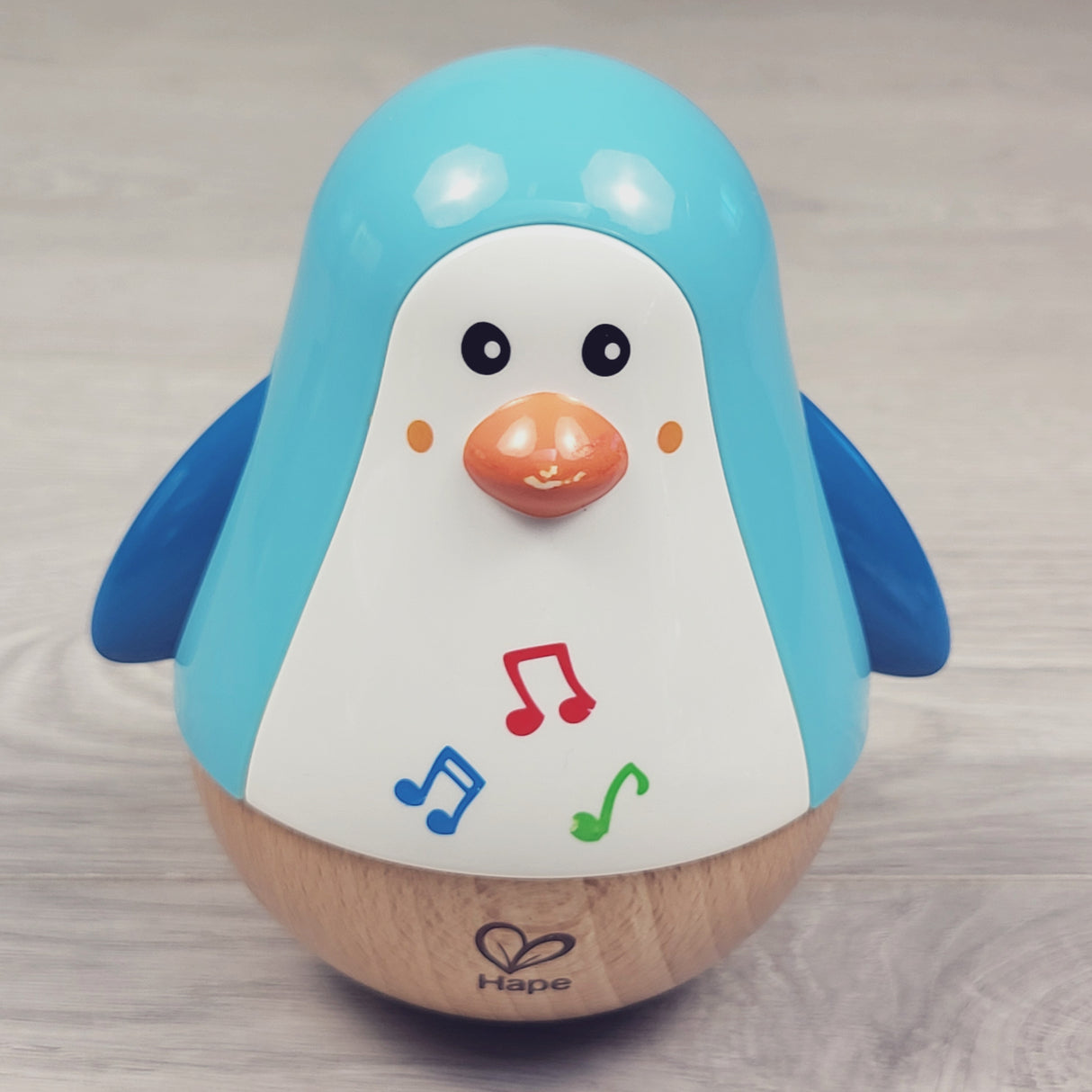 Hape Penguin Musical Wobbler toy