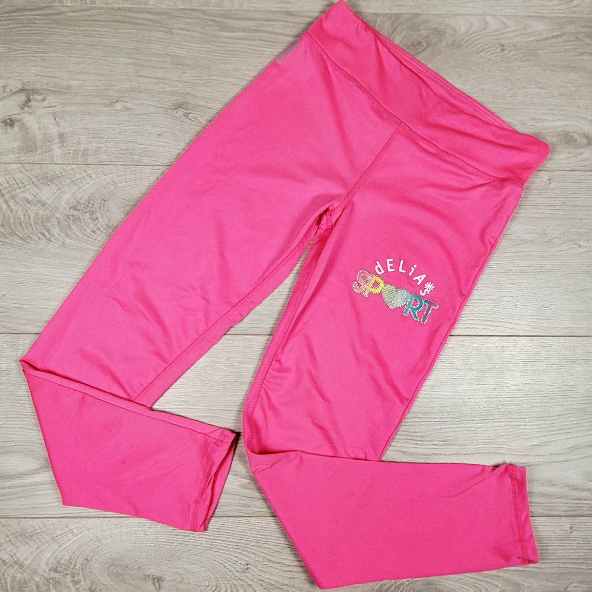 Delias Sport hot pink active leggings. Size 14/16