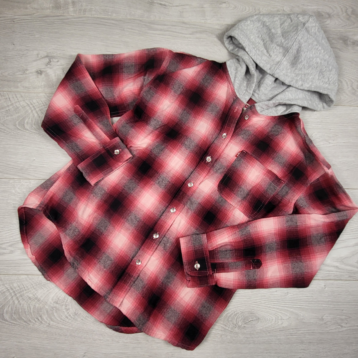 Levi's pink plaid hooded button down flannel shirt. Size 12/13