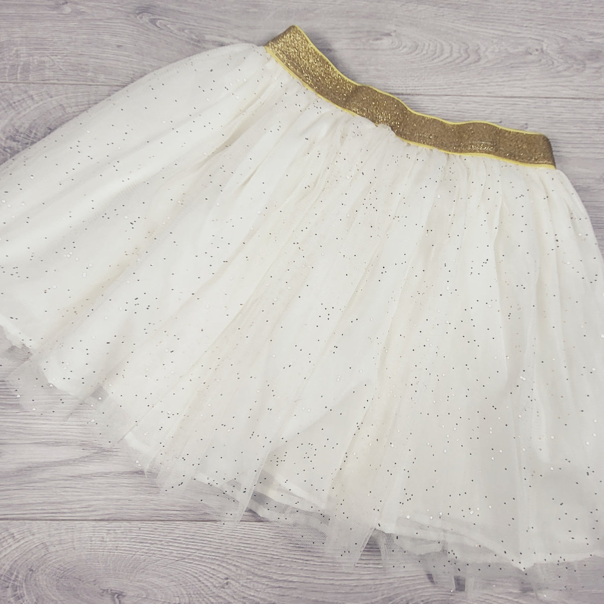 Btween white tulle skirt with gold spakles. Size 10