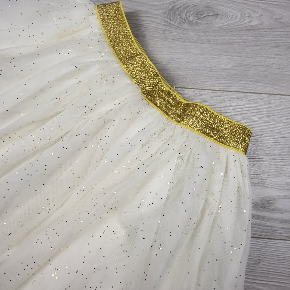 Btween white tulle skirt with gold spakles. Size 10
