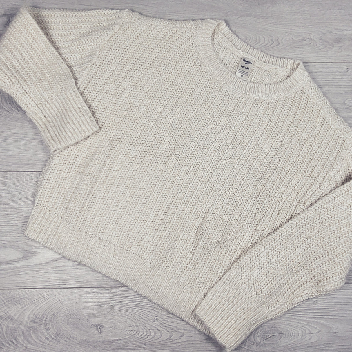 Oshkosh cream coloured sweater with gold sparkles. Size 10