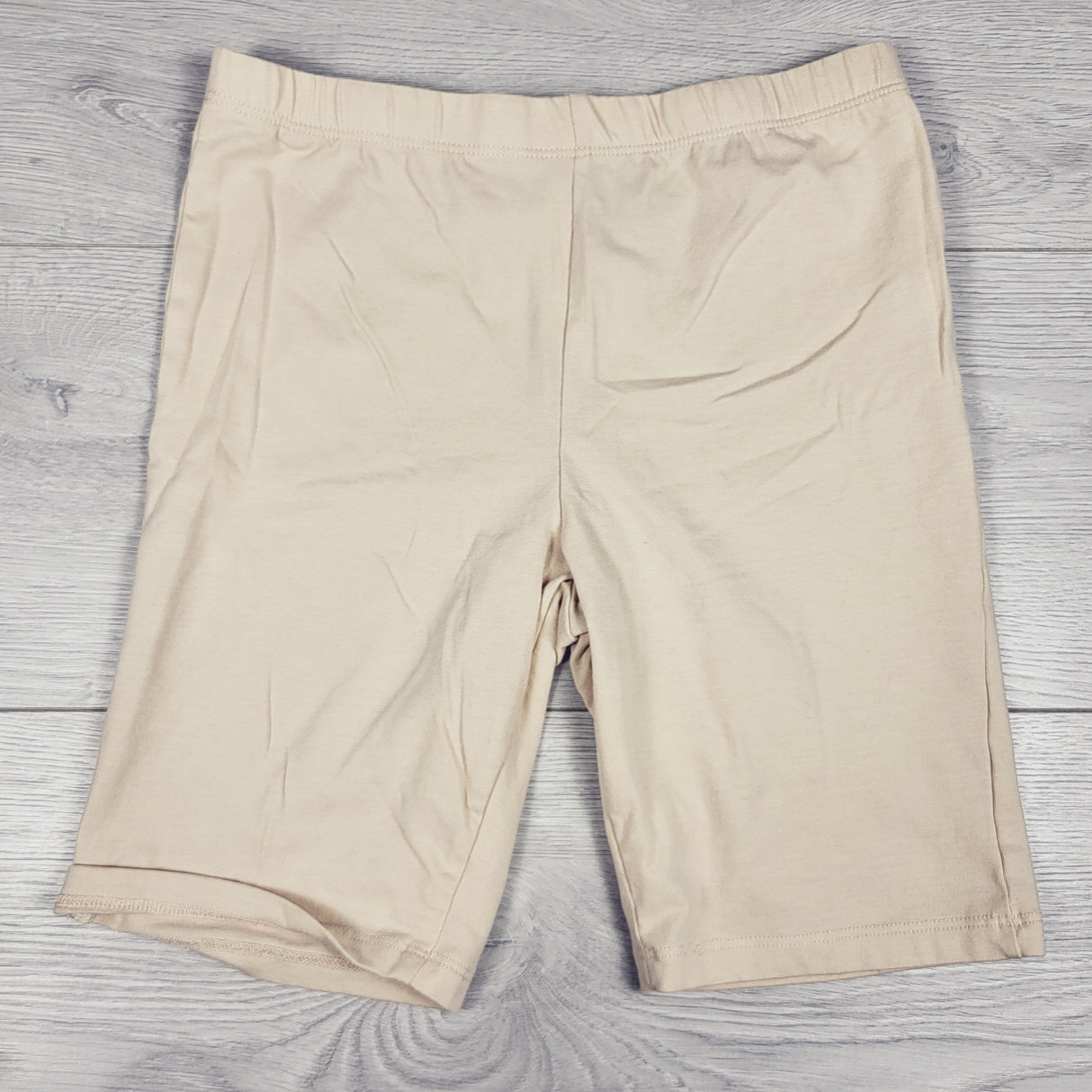 Sweet Attitude beige bike shorts. Size 14/16