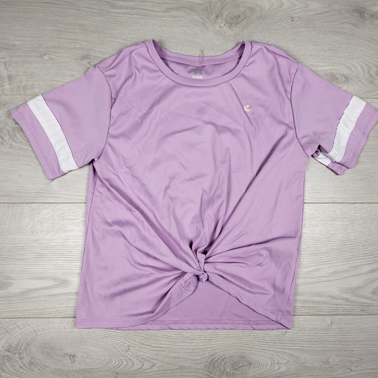 RBX purple ribbed front knot active t-shirt. Size 10/12