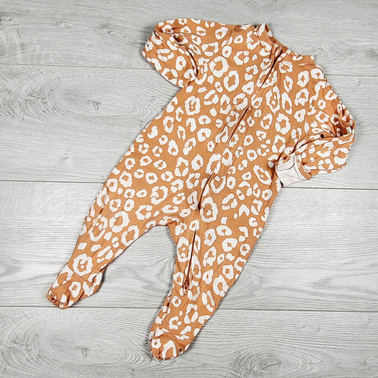 Old Navy peachy-orange zippered leopard print sleeper. Size 6-9 months