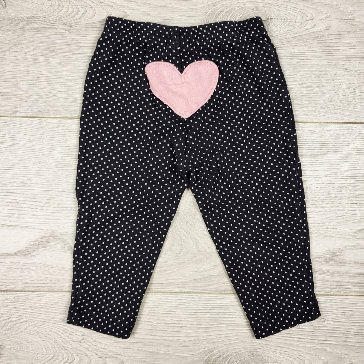 Child of Mine black polka dot pants with heart bum. Size 6-9 months