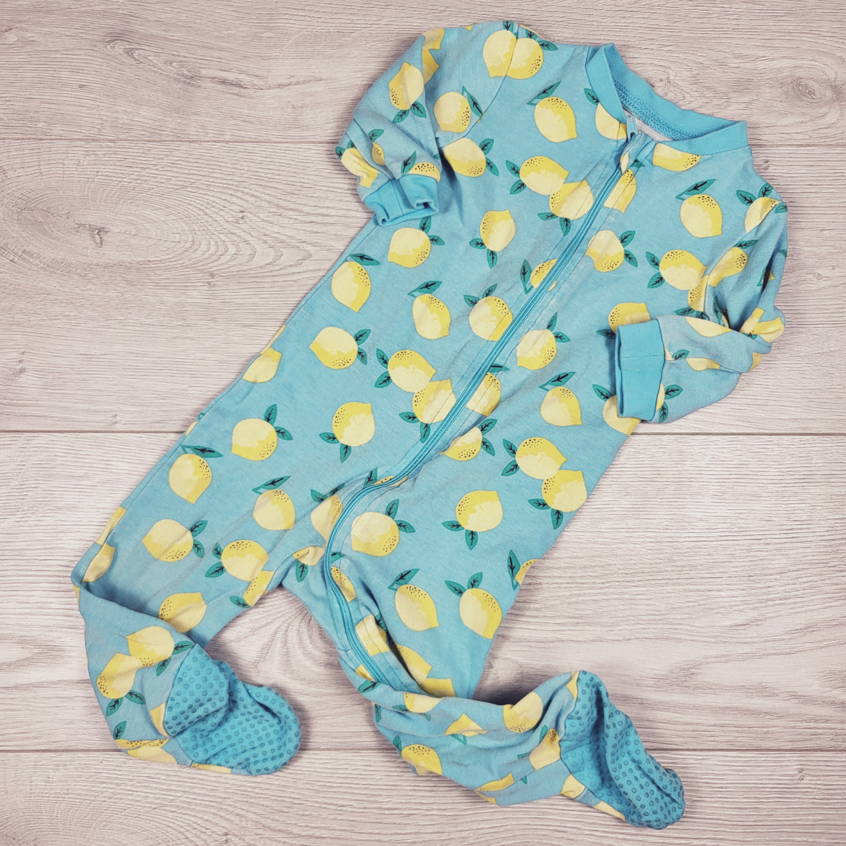 George blue zippered sleeper with lemons. Size 6-12 months