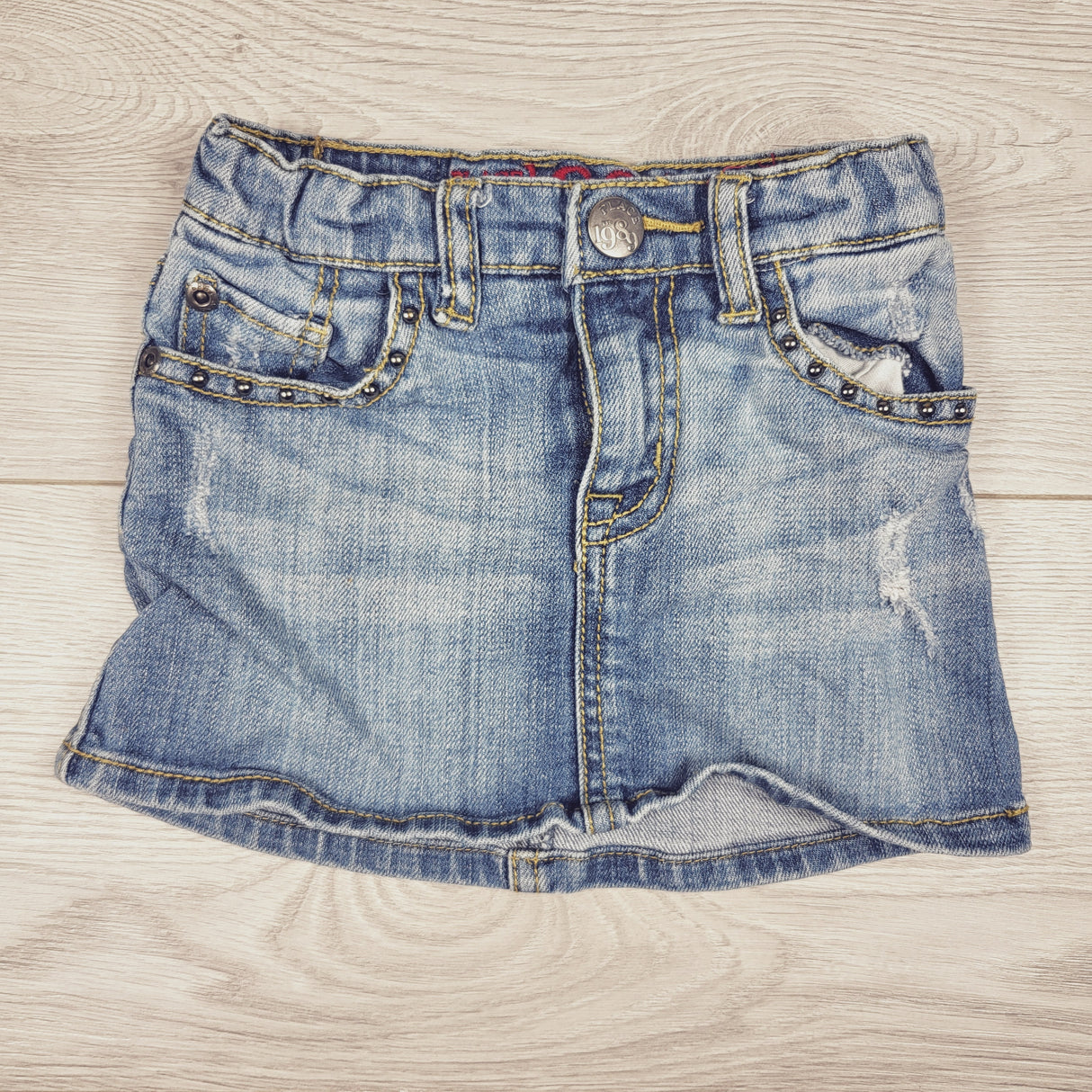 Gap 1969 distressed denim skirt with built in diaper cover. Size 24 months