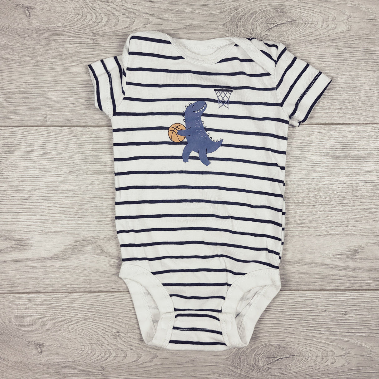 Pekkle white and navy striped bodysuit with dinosaur. Size 6 months