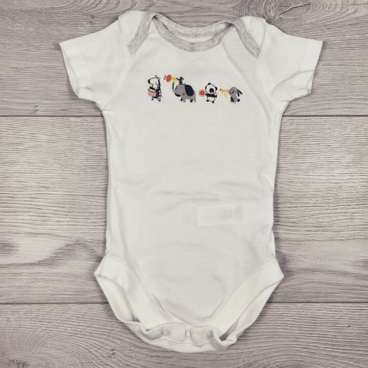 Bundles white bodysuit with musical animals. Size 0-3 months