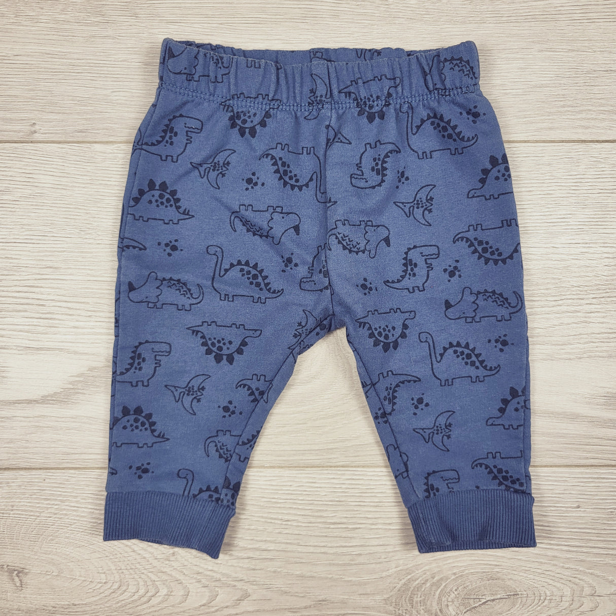 Pekkle blue dinosaur print pants. Size 3 months