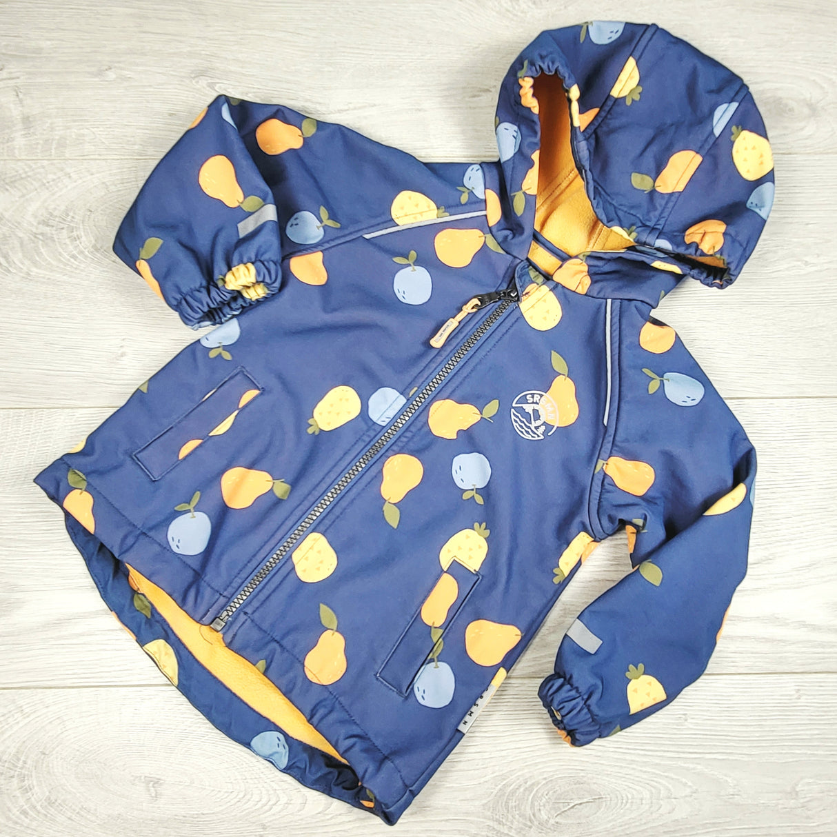 Souris Mini fleece lined soft shelled fruit print rain coat. Size 12-18 months