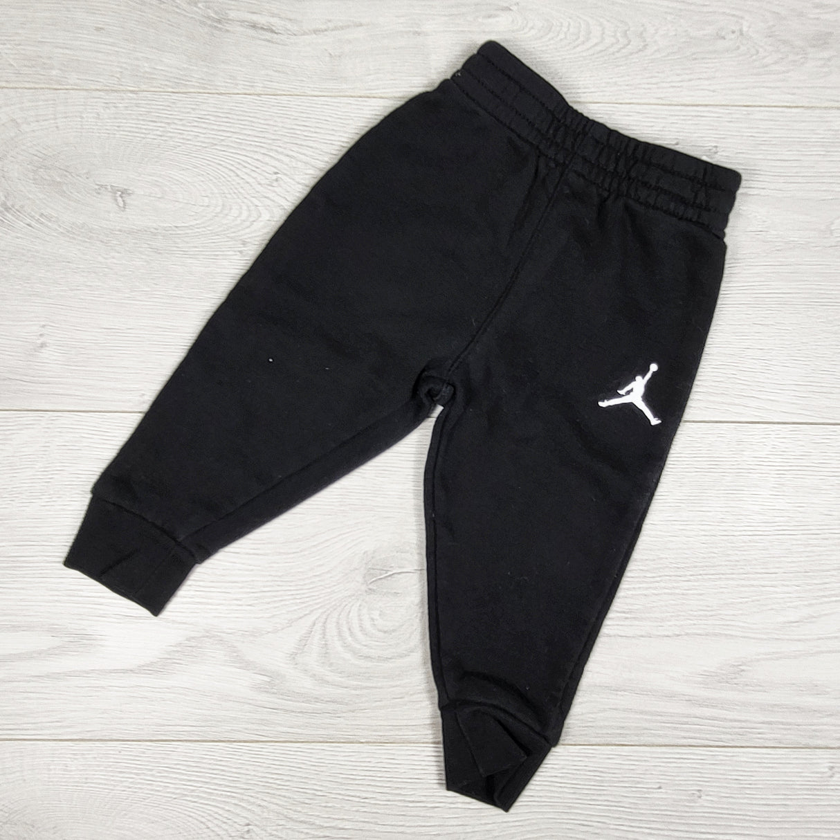 Nike Air Jordan black fleecy lined pants. Size 12 months