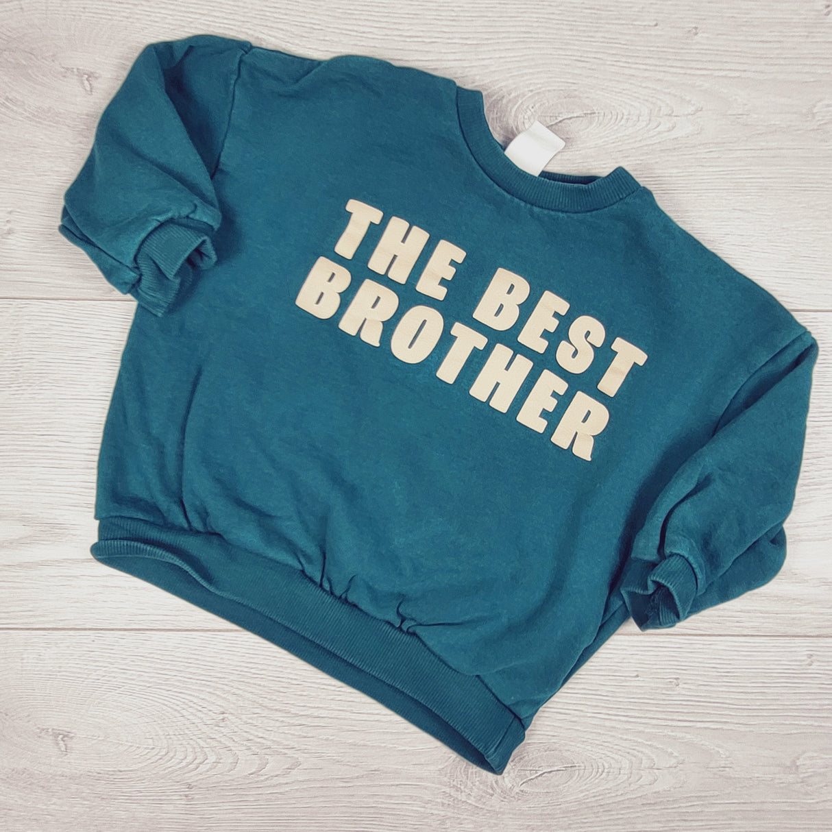 H and M teal green "The Best Brother" fleecy lined crewneck sweatshirt. Size 12-18 months