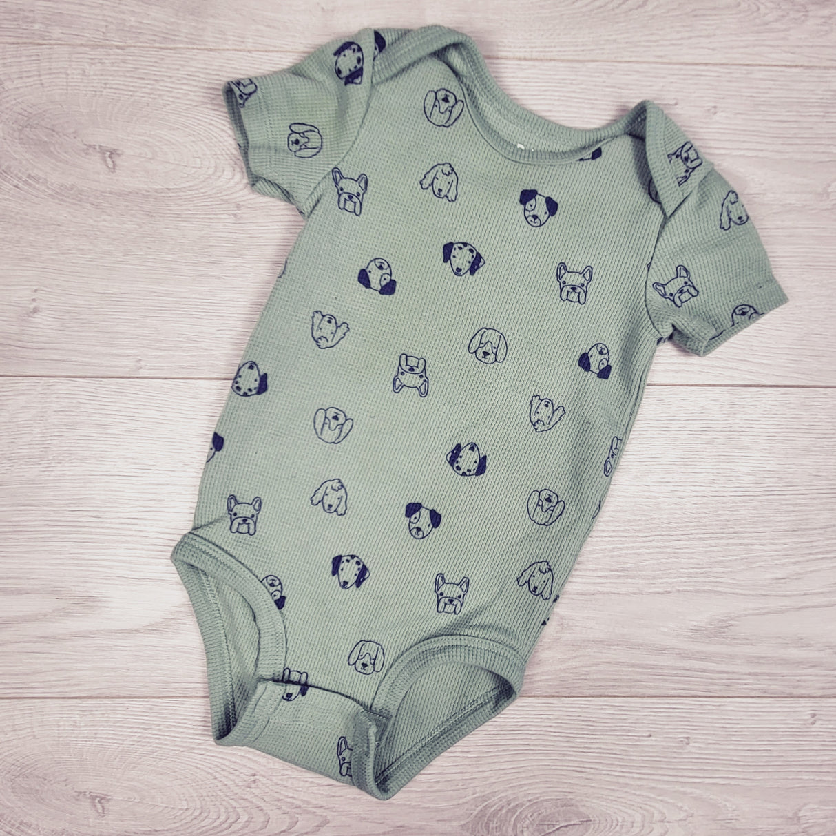 Pekkle green waffle knit bodysuit with dogs. Size 18 months