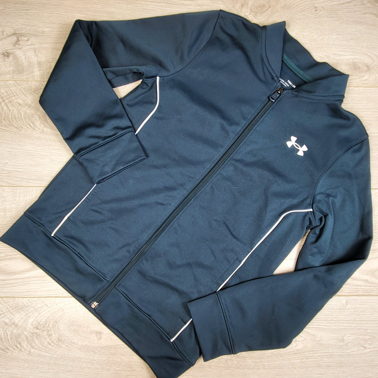 Under Armour teal loose fit zip up active jacket. Size medium